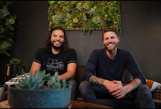 Co-founders Misha and Matt sitting in the bar area of the roastery.
